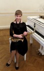 Индивидуальные занятия с репетитором по игре на саксофоне - репетитор Наталья Александровна.